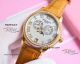 Best replica Patek Philippe mother-of-pearl dial gold diamond bezel leather strap watch (2)_th.jpg